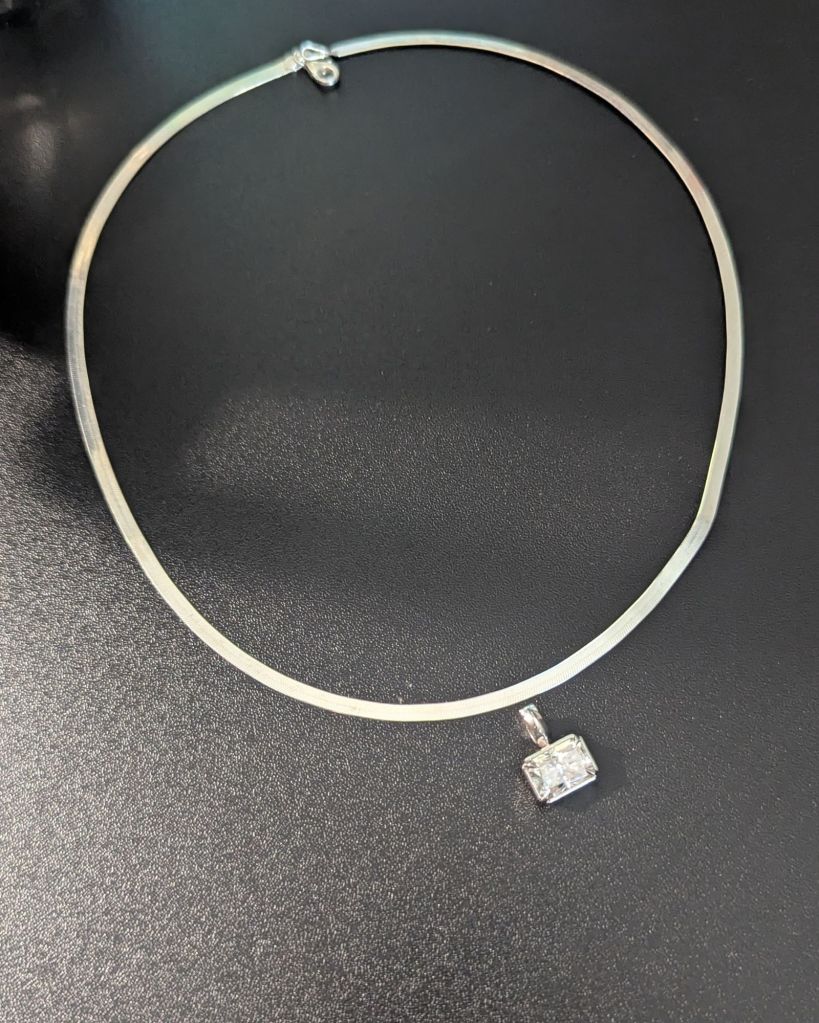 White gold herringbone snake chain with moissanite pendant